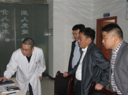 邹圣福到遵医附院德江县人民医院调研